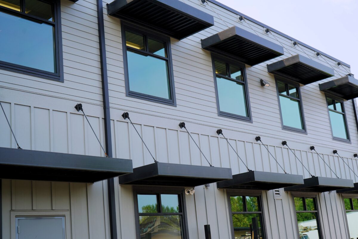 The FRAN building facade with rows of awning-covered windows